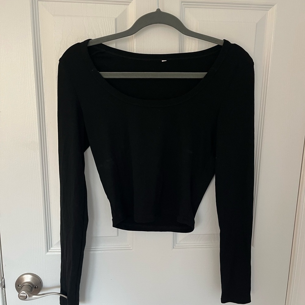 Light weighted, slightly cropped, soft tee from Amazon.